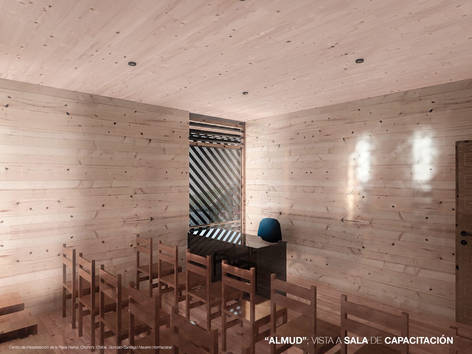 Sala de capacitación del almud, con mesas dispuestas para taller y paneles de madera clara